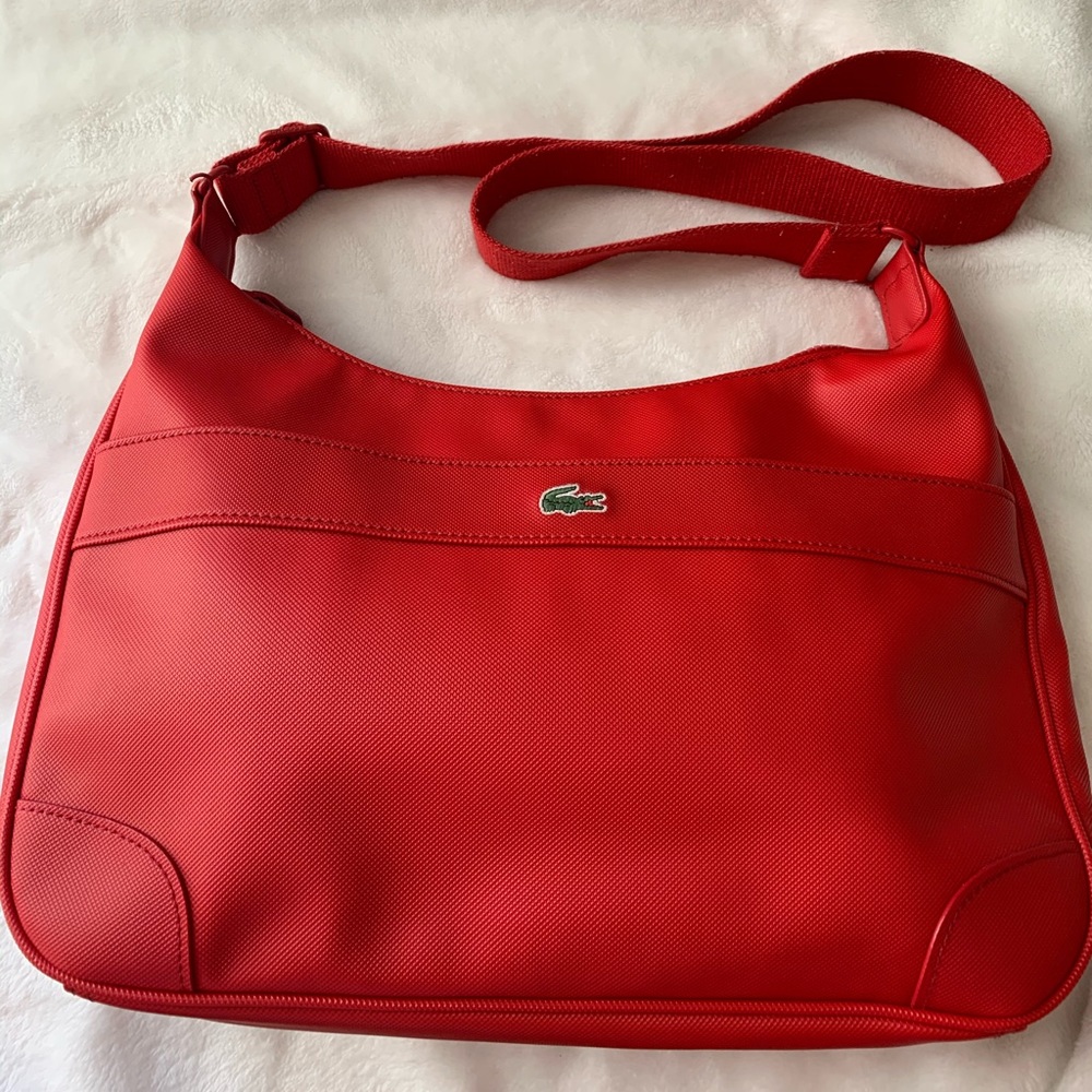 Lacoste cross body/shoulder bag/ authentic